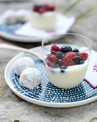 Creamy citrus puddings with fresh berries