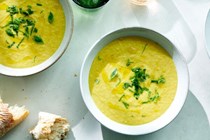 Creamy corn soup with basil
