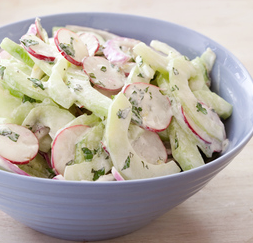 Creamy cucumber salad with radish, lemon zest, and mint