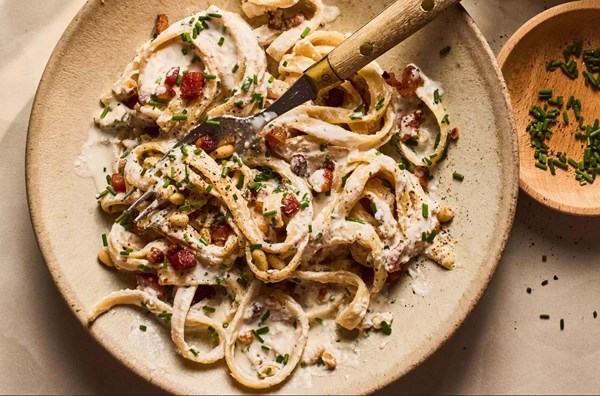 Creamy fettuccine with ricotta, pine nuts & crispy pancetta