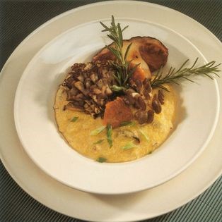 Creamy garlic polenta with wild mushrooms and tomato-fennel broth 