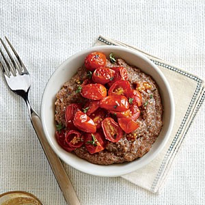 Creamy Gorgonzola teff with herb-roasted tomatoes
