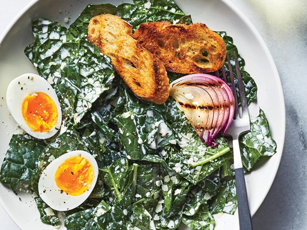 Creamy kale Caesar salad with soft-boiled eggs