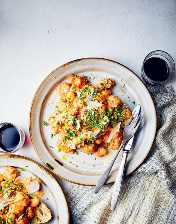 Creamy mascarpone butter beans with sausage and gremolata