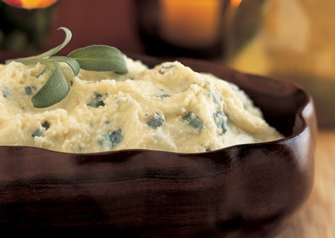 Creamy mashed potatoes with goat cheese and fresh sage