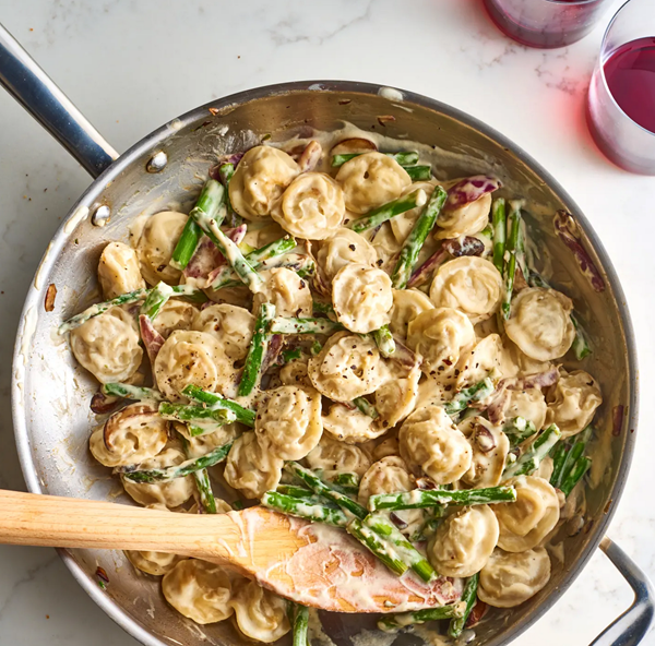 Creamy mushroom and asparagus dumpling skillet