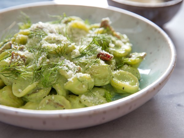 Creamy orecchiette with spring onions, fennel, and bacon