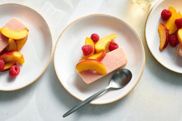 Creamy peach sorbet with raspberries