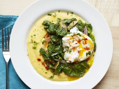 Creamy polenta with braised greens and poached eggs