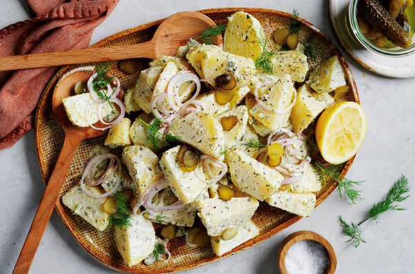 Creamy potato salad with tartare sauce and pickles