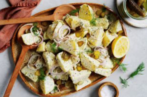 Creamy potato salad with tartare sauce and pickles