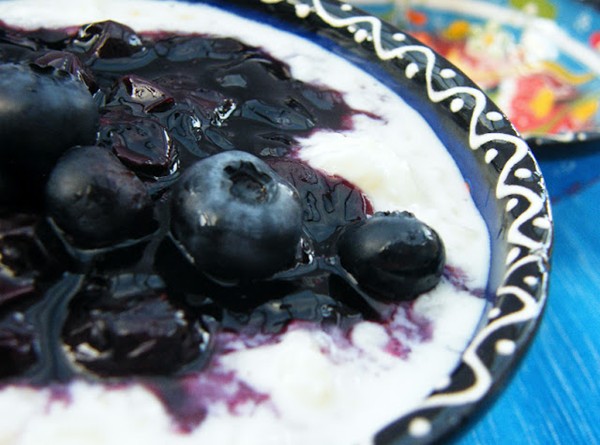 Creamy rice pudding with a boozy berry compote