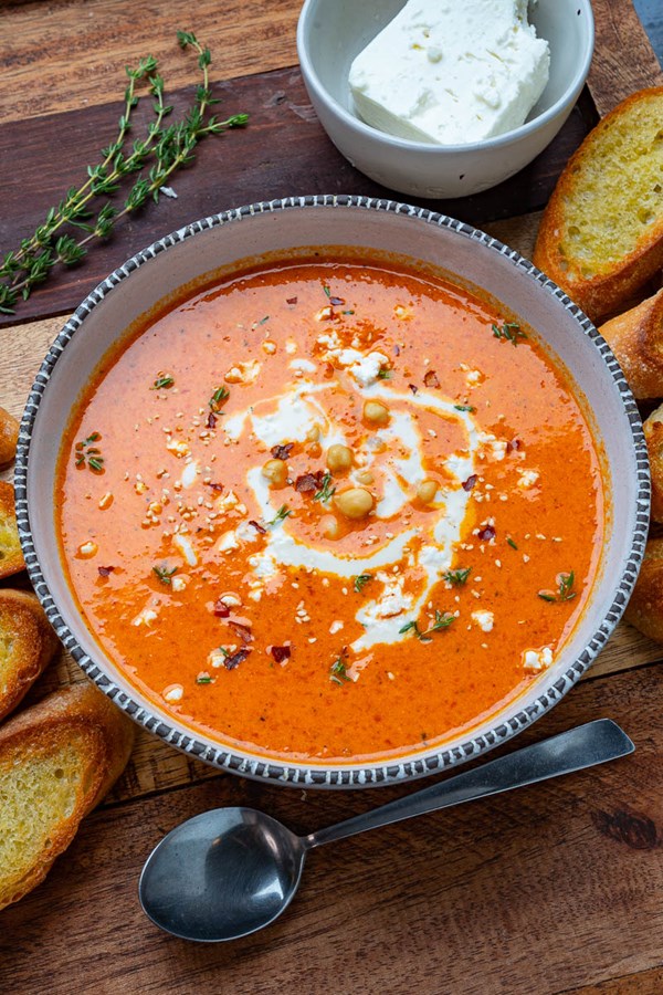 Creamy roasted red pepper chickpea soup with tahini and feta