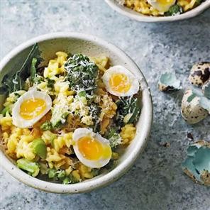 Creamy saffron and quail egg risotto with purple sprouting broccoli