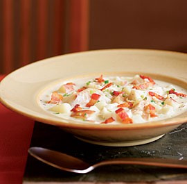 Creamy seafood chowder with bacon, thyme, and jalapeño