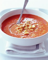 Creamy tomato soup with toasted almonds