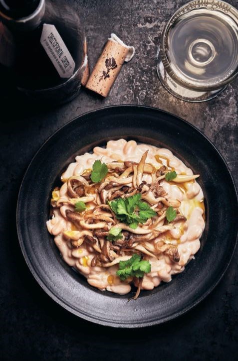 Creamy white beans and oyster mushroom sautéed in white wine