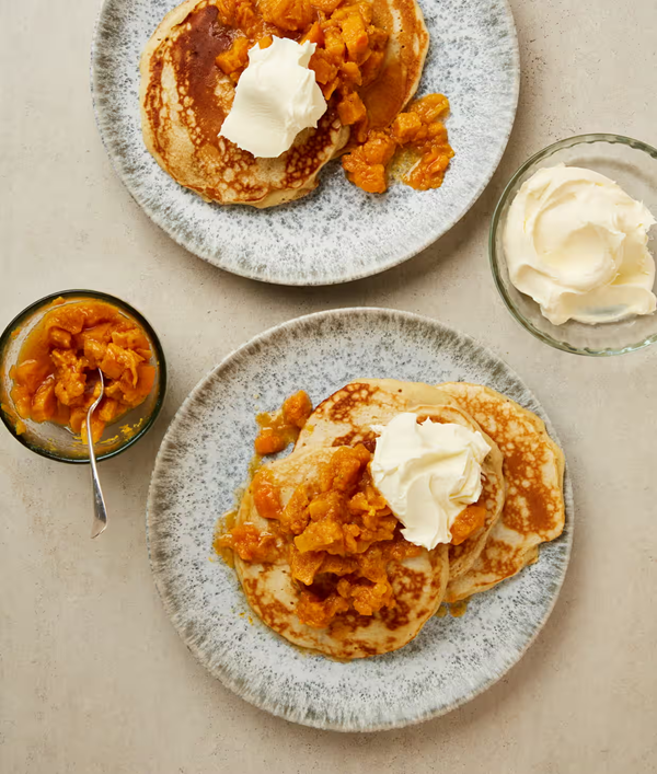 Crempogau with persimmon compote
