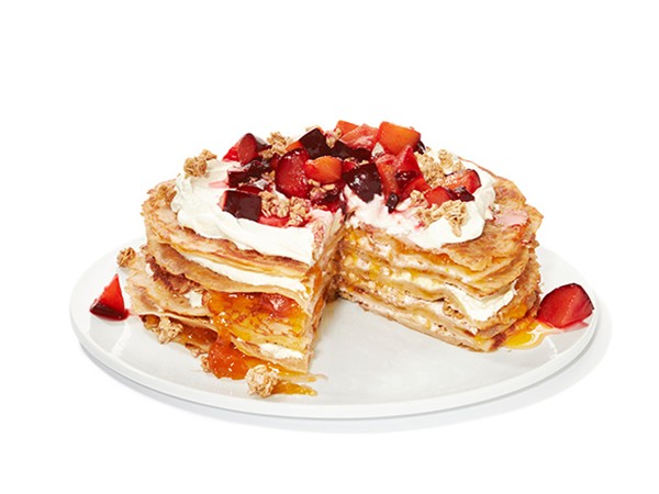 Crêpe cake with granola and plums