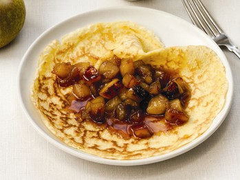 Crêpes filled with caramelized apples and served with maple crème fraîche