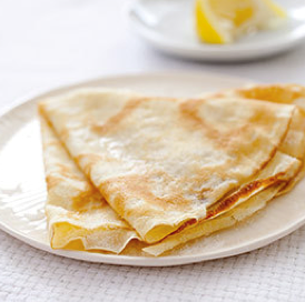 Crêpes with dulce de leche and toasted pecans