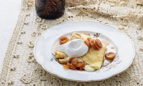 Crêpes with homemade ricotta and maple-kumquat syrup