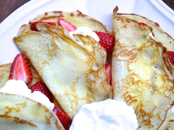 Crepes with strawberries and cream