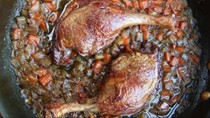 Crisp-braised duck legs with aromatic vegetables