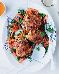 Crisp chicken thighs with peas and carrots