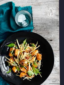 Crisp fish, green mango and roast coconut salad
