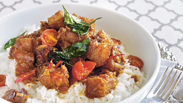 Crisp-fried pork belly with sticky tomato shrimp paste sauce (Binagoongang baboy)