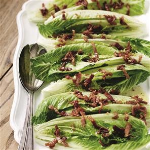 Crisp lettuce hearts with a hot bacon, maple syrup and garlic dressing