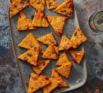 Crisp Parmesan, olive & sundried tomato polenta bites