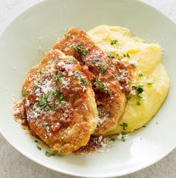 Crisp Parmesan pork cutlets with tomato sauce