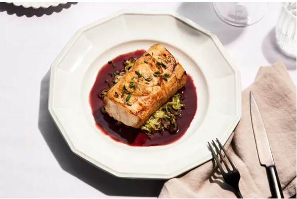 Crisp paupiettes of sea bass in a Barolo sauce
