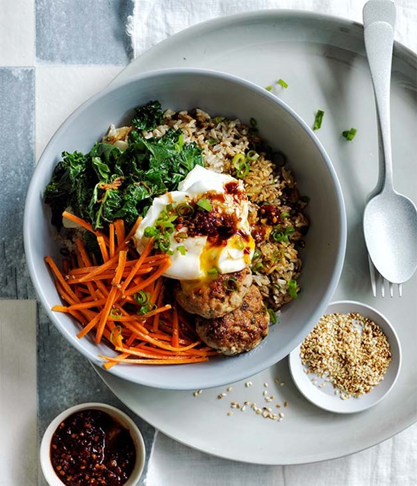 Crisp rice bowls with pork, egg, kale and marinated carrot