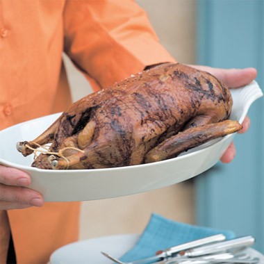 Crisp roast duck with olives