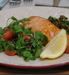 Crisp salmon with green herb and caper sauce