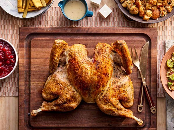 Crisp-skinned spatchcocked (butterflied) roast turkey with gravy