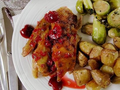 Crisp-tender roast duck with cherry-rosemary sauce