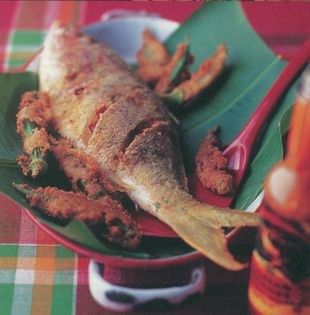 Crispy adobo fried fish in coconut oil with okra