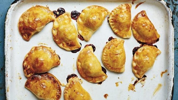 Crispy-baked pierogi stuffed with pork and pine nuts