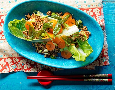 Crispy basil salad with pork and pickled carrots