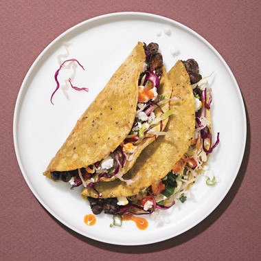 Crispy black bean tacos with feta and cabbage slaw