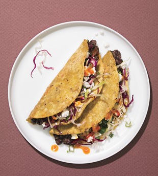 Crispy black bean tacos with feta and cabbage slaw