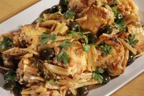 Crispy braised chicken thighs with olives, lemon, and fennel