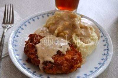 Crispy breaded pork chops with milk gravy