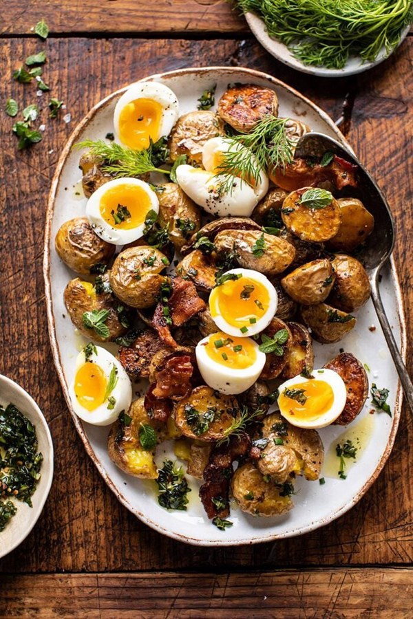 Crispy breakfast potatoes with chili garlic oil and herbs