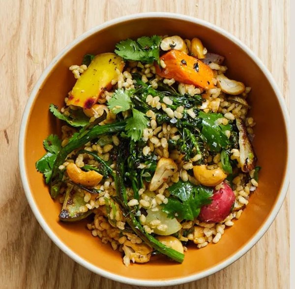 Crispy brown rice with deeply roasted broccoli, carrots, and turnips