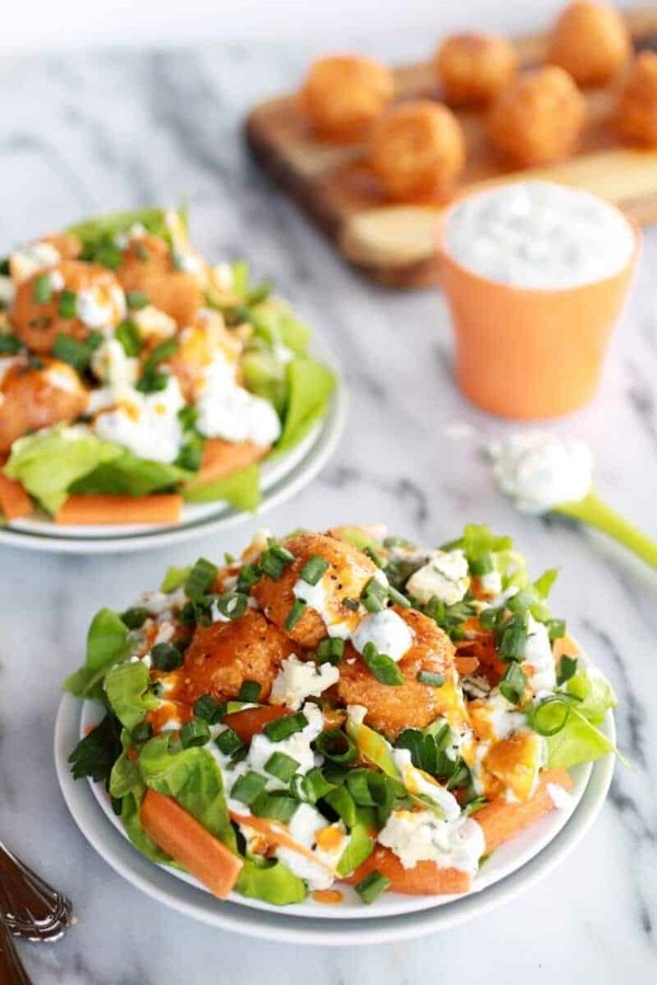 Crispy Buffalo quinoa bites salad with cheesy ranch